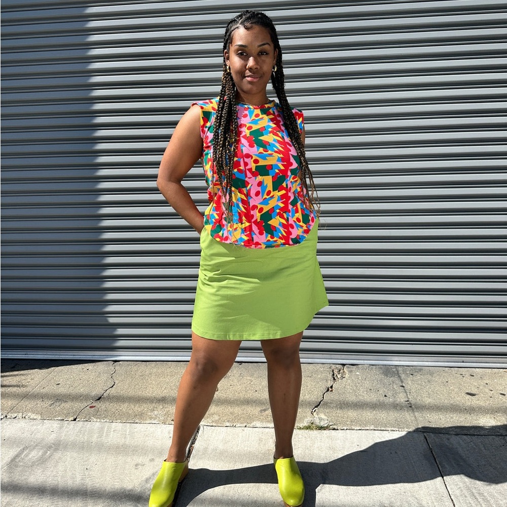 Winter is coming… be a ray of sunshine ☀️NWT Macarena Muscle Tee